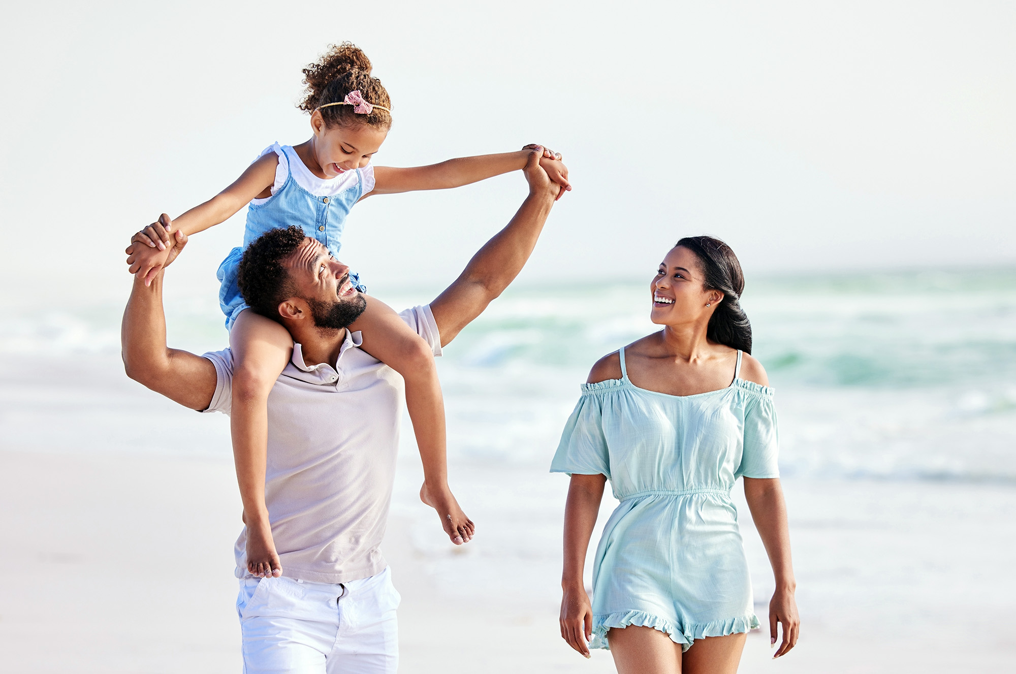 Family Walking on Beach