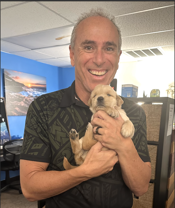 Image of Dr. Pete with puppy