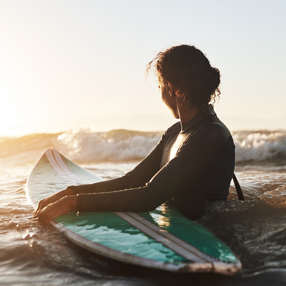 Surfer at sunset