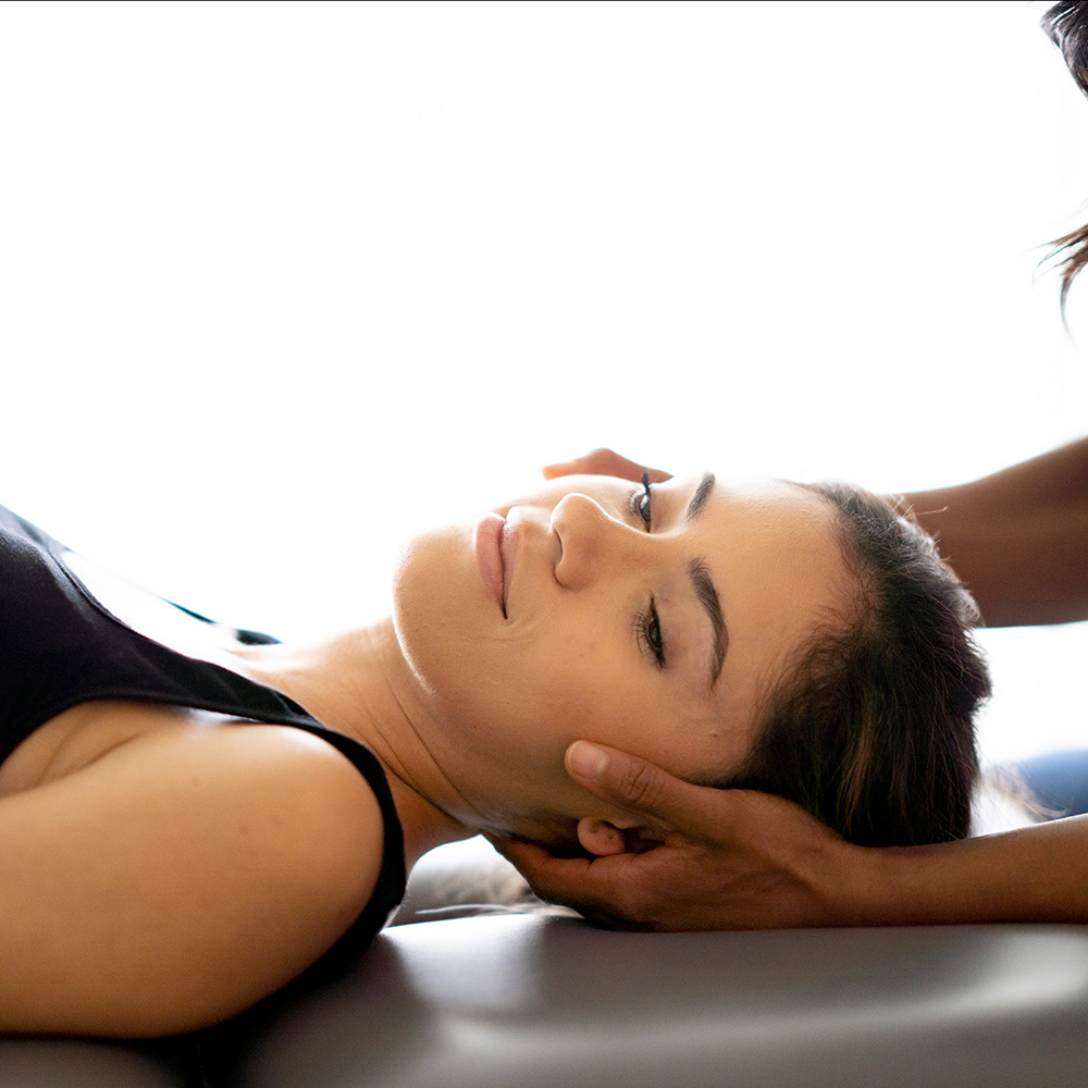 Woman receiving chiropractic care